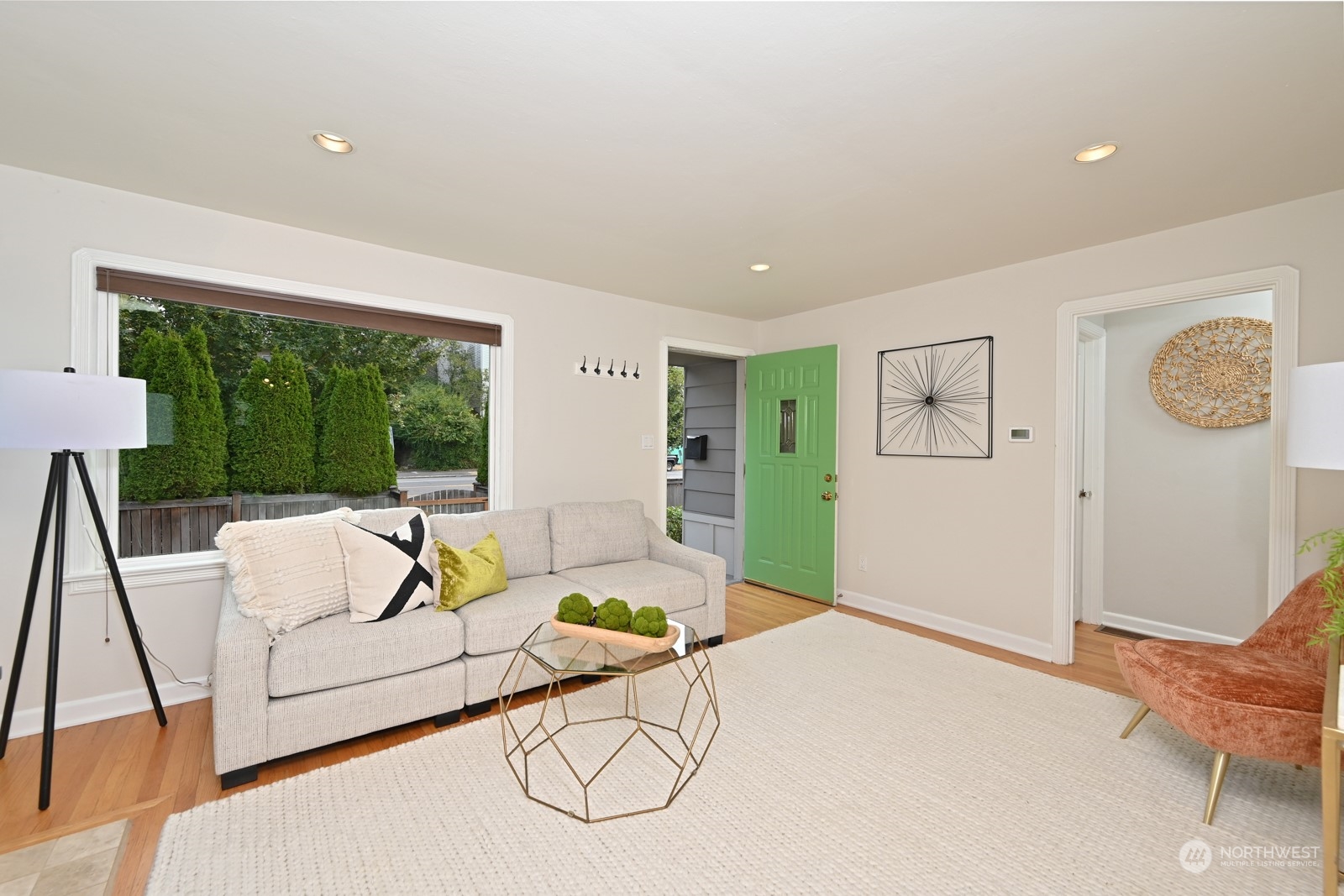 6037 Fauntleroy Way Southwest Seattle, WA 98136 - Photo 4 of 37 a living room with furniture and a large window