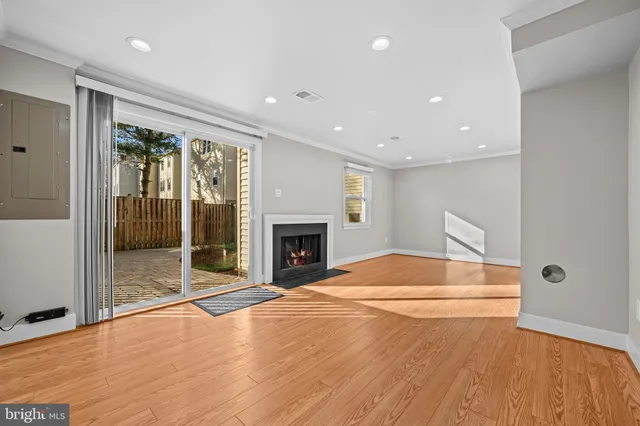 a bedroom with a bed and a fireplace