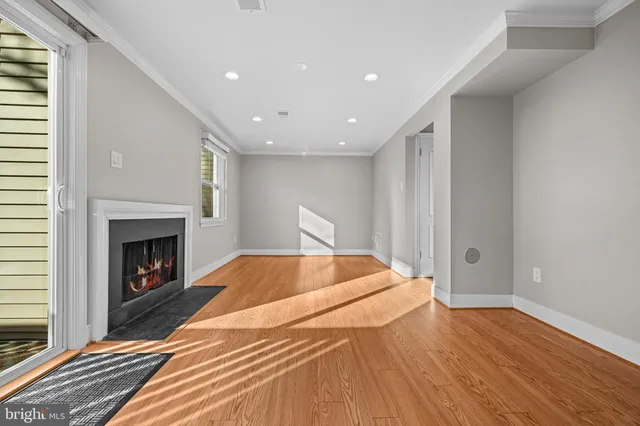a bathroom with a granite countertop toilet sink and bathtub