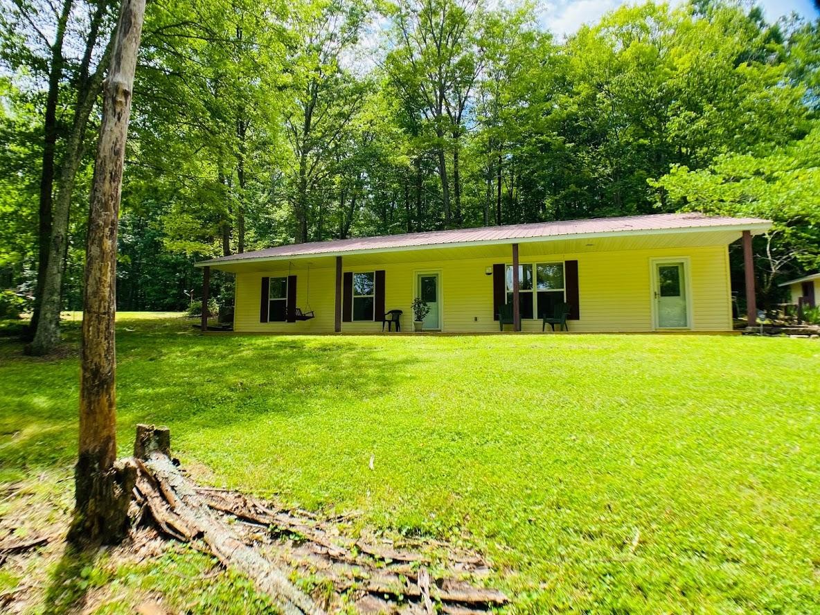 1034 Star Point Road Jamestown, TN 38556 - Photo 3 of 35 a view of a house with backyard