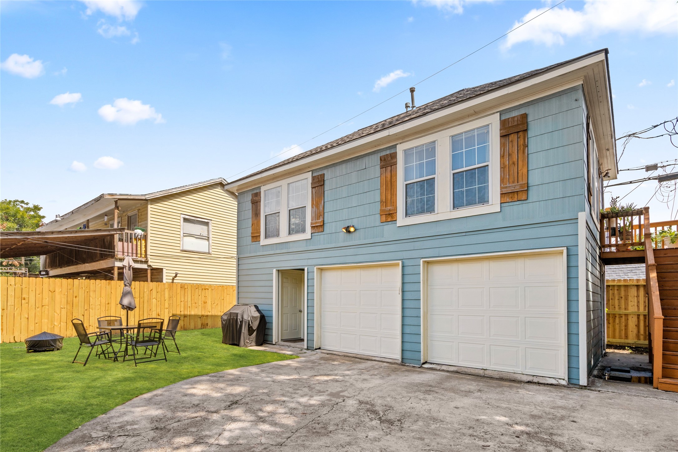 5227 Lawndale Street Houston, TX 77023 - Photo 12 of 32 a front view of a building with a garden
