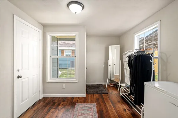 wooden floor and windows in a room