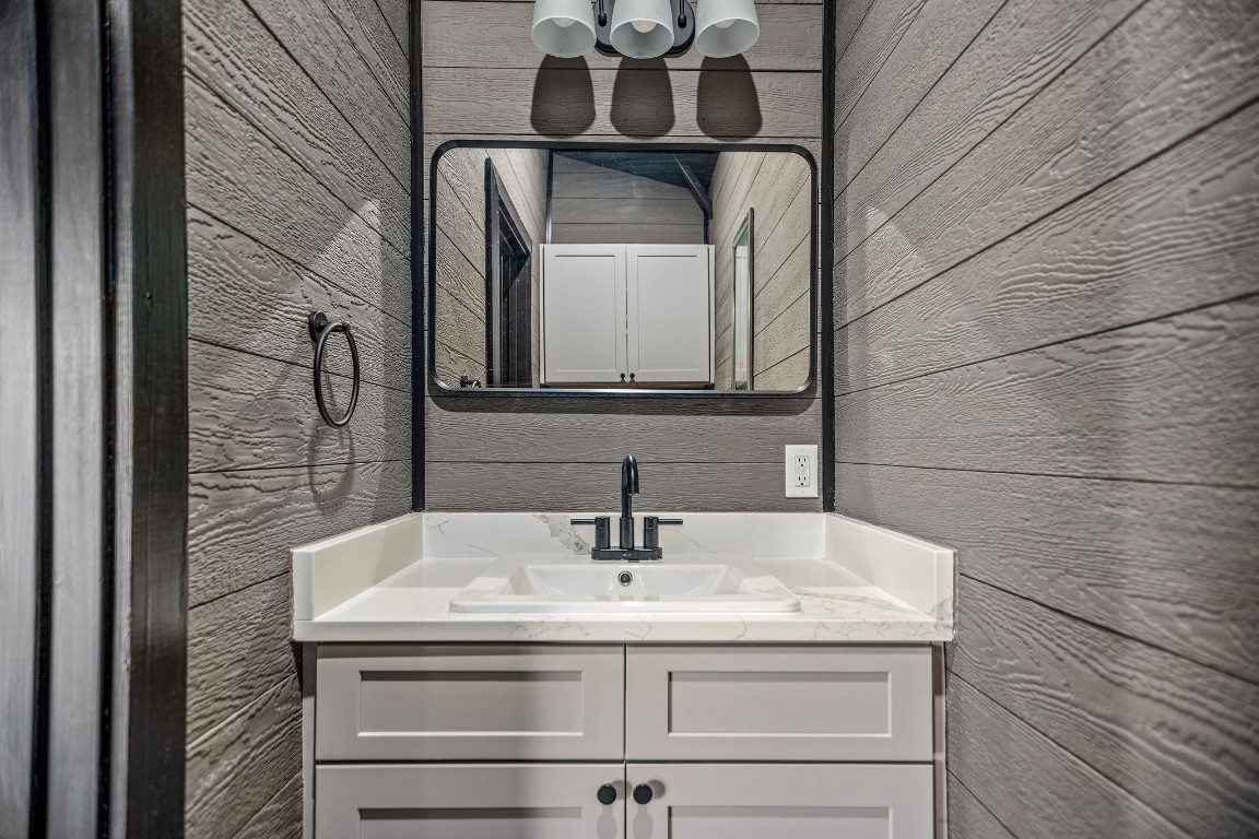 1236 Riverside Drive Palacios, TX 77465 - Photo 12 of 35 a bathroom with a sink and a mirror