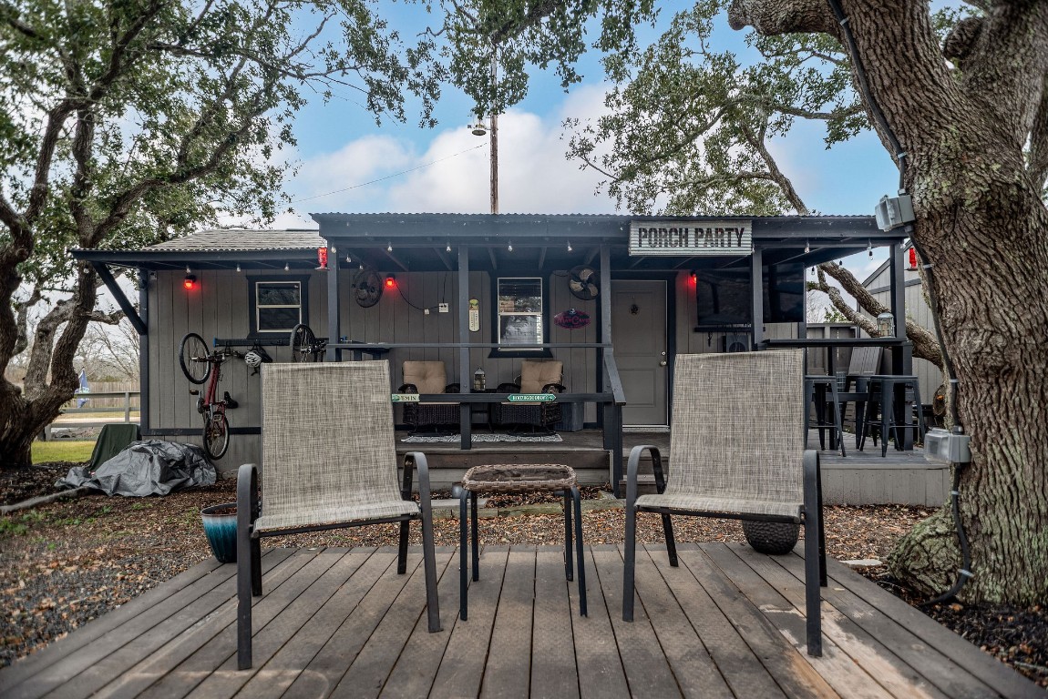 1236 Riverside Drive Palacios, TX 77465 - Photo 27 of 35 a front view of a house with table and chairs