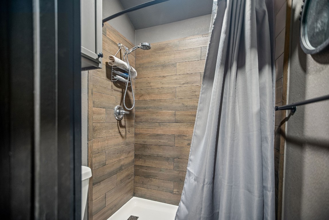 1236 Riverside Drive Palacios, TX 77465 - Photo 29 of 35 a bathroom with a shower