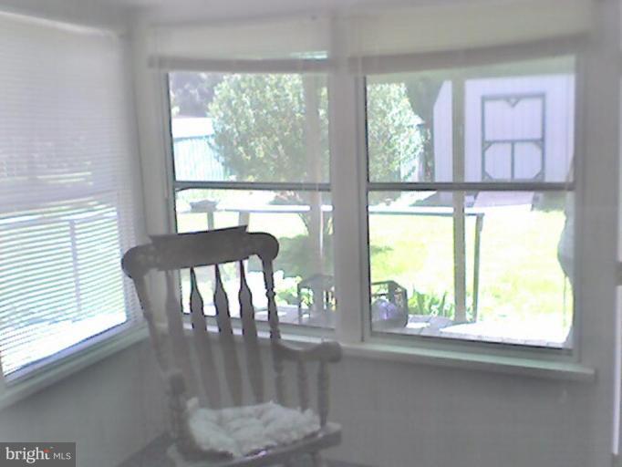 18319 Point Lookout Road Park Hall, MD 20667 - Photo 5 of 12 View on porch