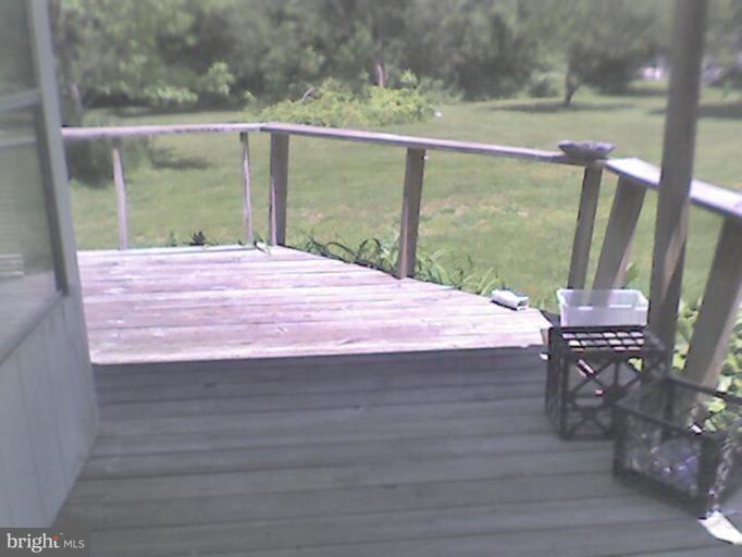 18319 Point Lookout Road Park Hall, MD 20667 - Photo 6 of 12 Deck wraps around