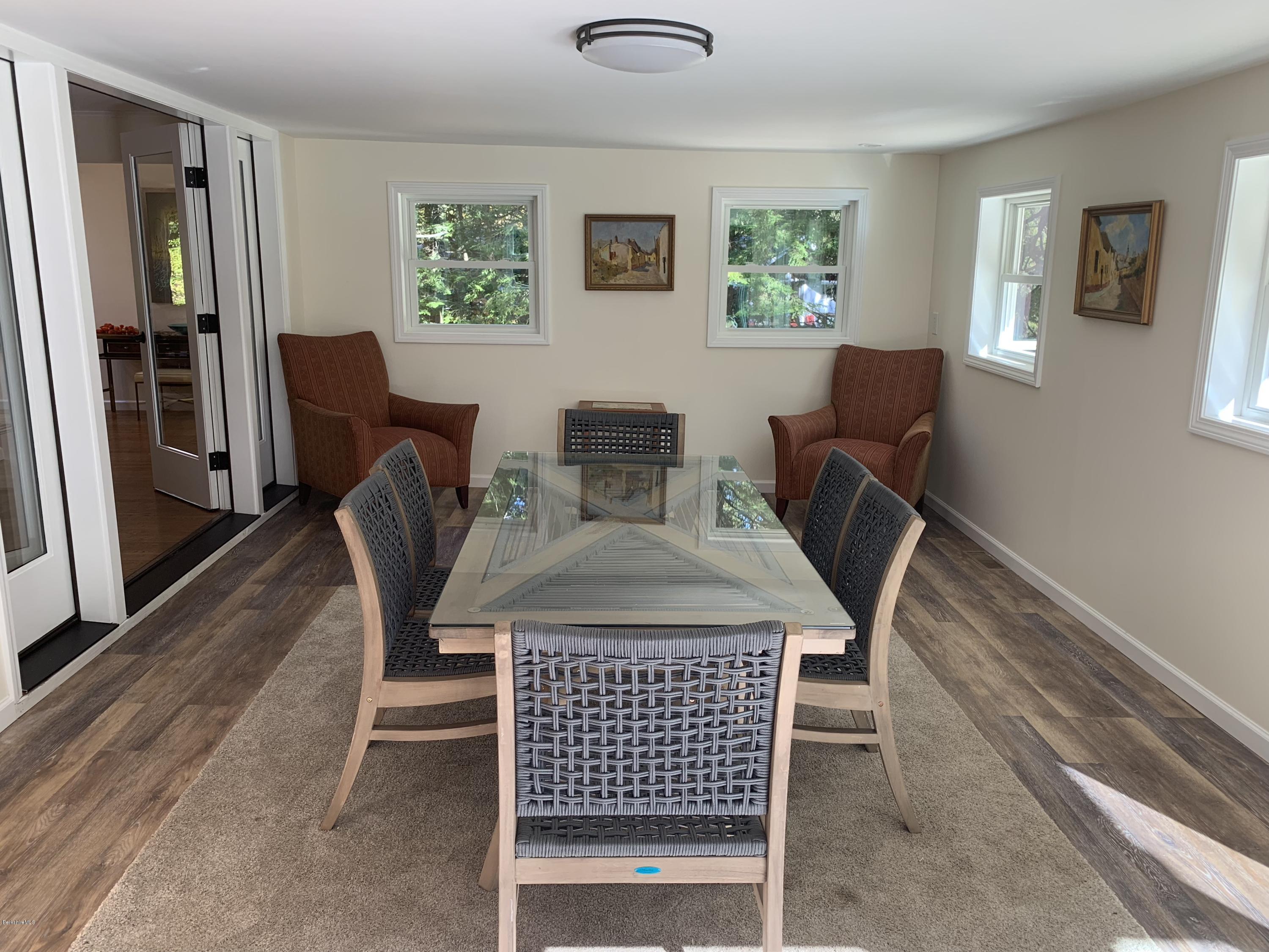 261 Old Stockbridge Road Lenox, MA 01240 - Photo 13 of 43 a view of a dining room with furniture