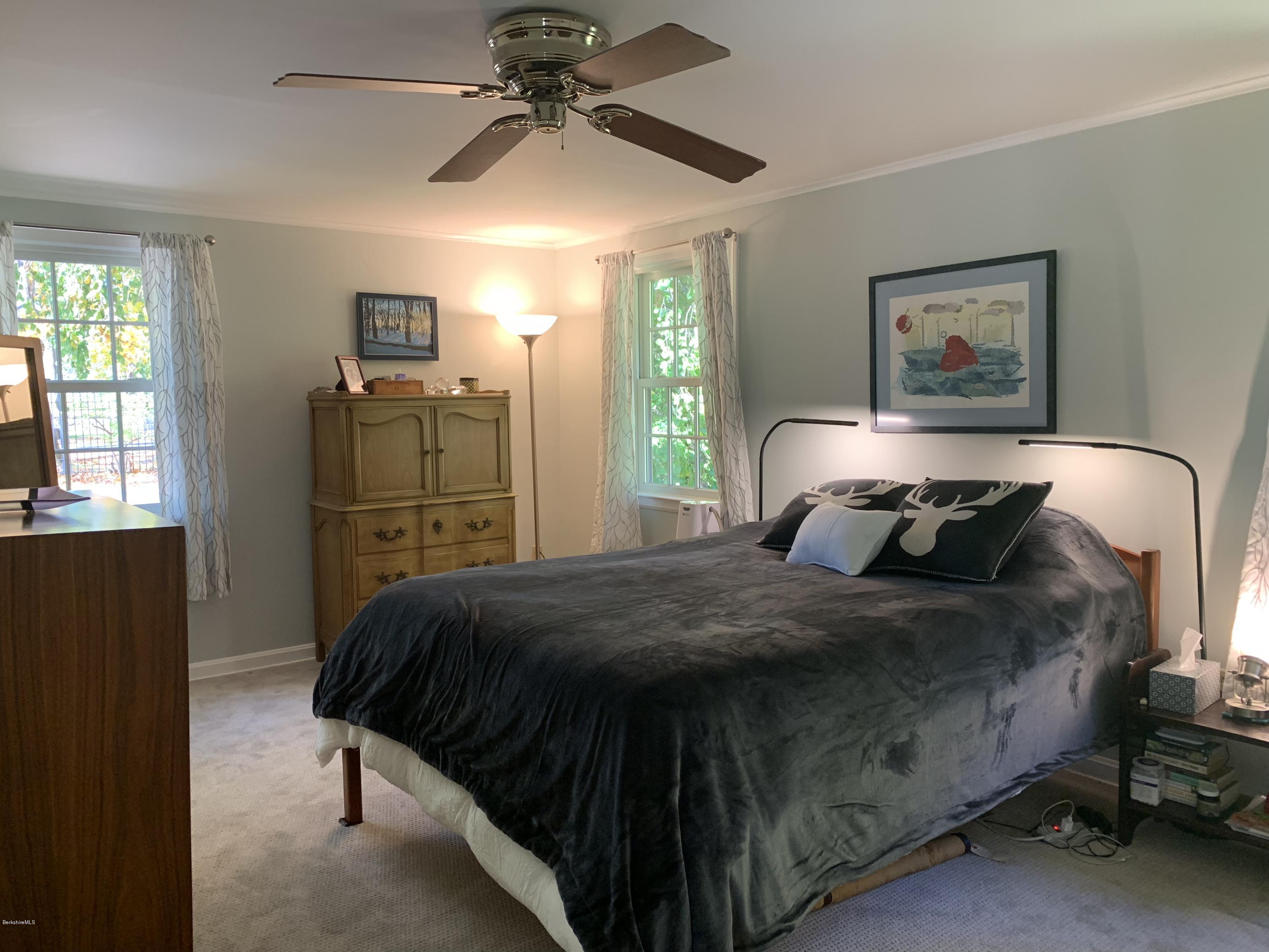 261 Old Stockbridge Road Lenox, MA 01240 - Photo 24 of 43 a bedroom with a bed and a window