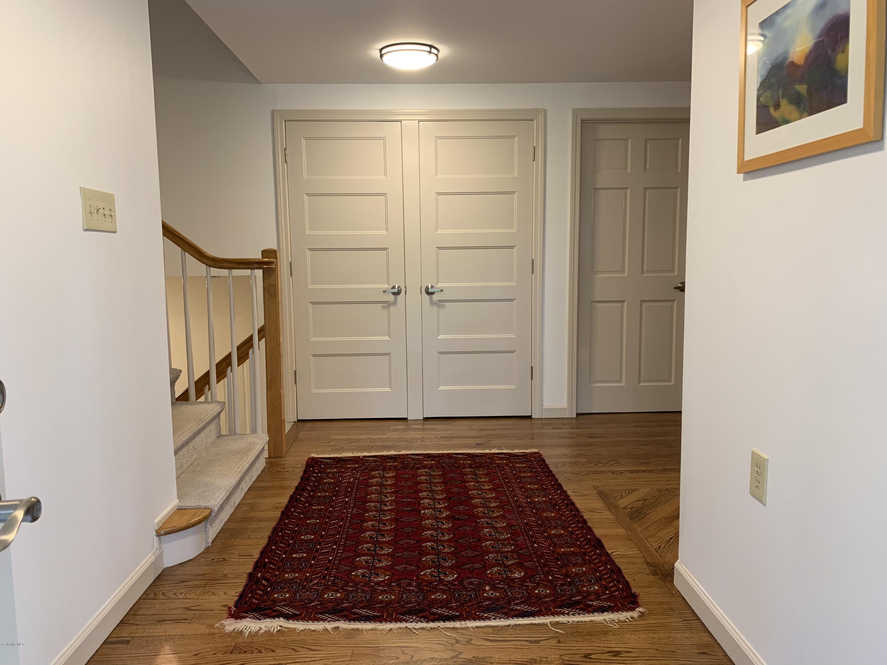 261 Old Stockbridge Road Lenox, MA 01240 - Photo 4 of 43 an entryway in front of a house