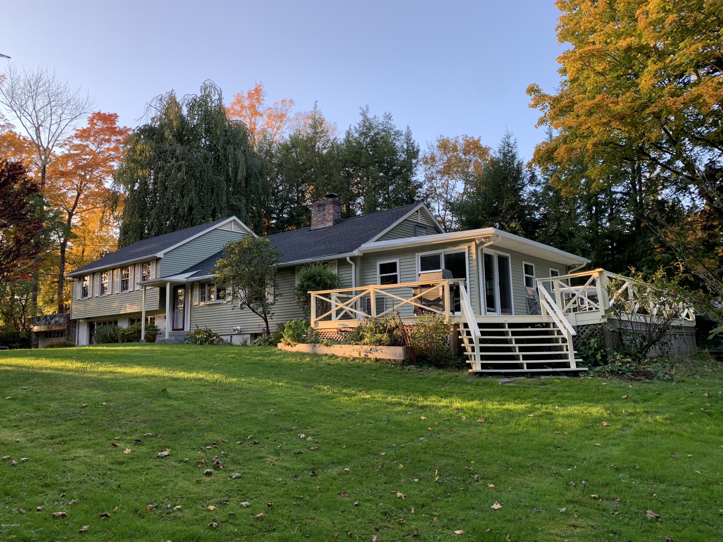 261 Old Stockbridge Road Lenox, MA 01240 - Photo 35 of 43 a front view of a house with a yard