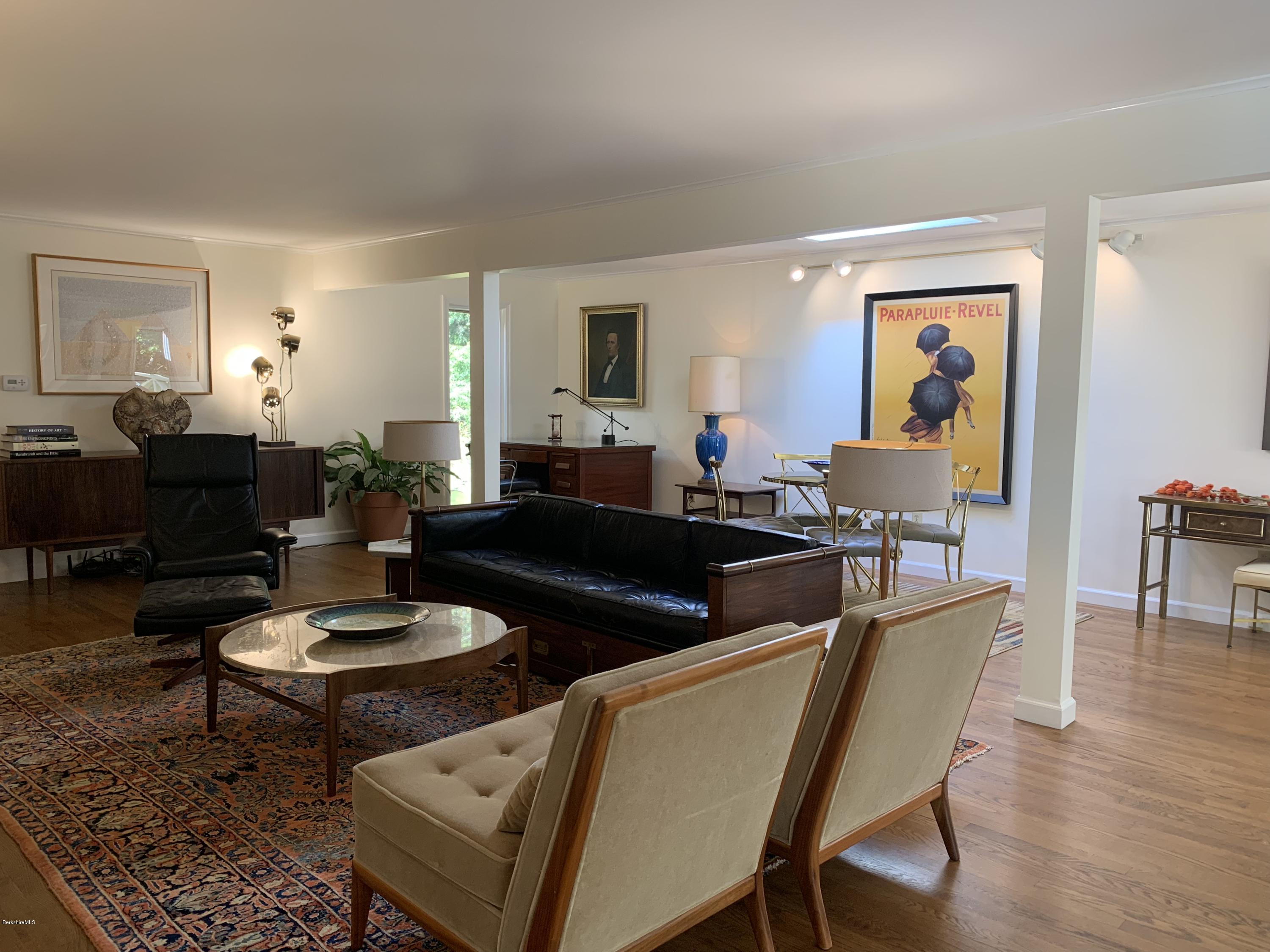 261 Old Stockbridge Road Lenox, MA 01240 - Photo 7 of 43 a living room with furniture and wooden floor