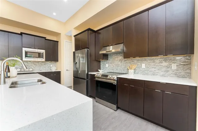 a view of room with window and ceiling fan