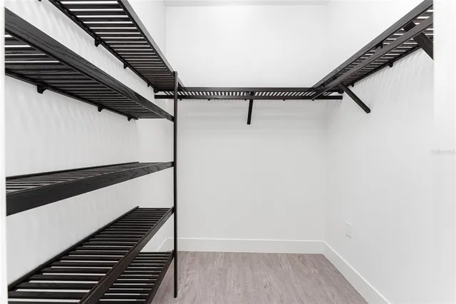 a bathroom with a shower toilet and sink