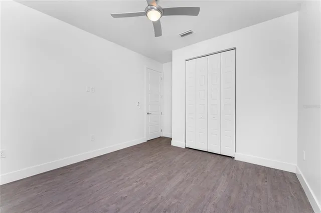 a view of a swimming pool with a porch