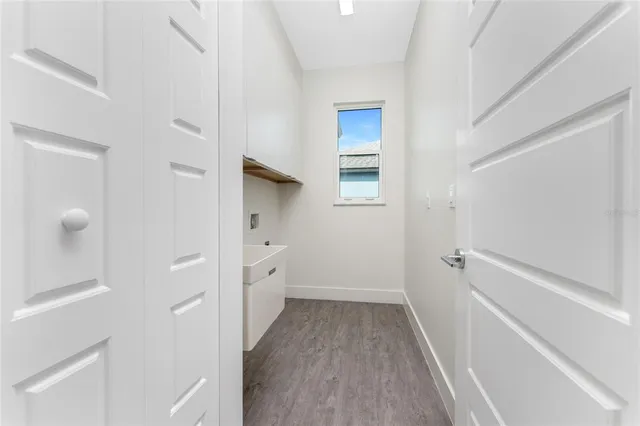 an aerial view of a house with a ocean view