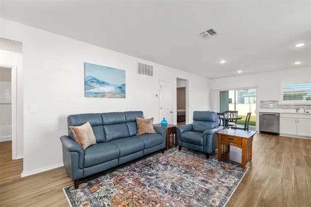 a living room with furniture and a couch