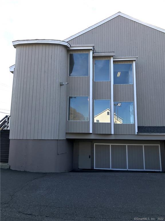 3250 East Main Street, Unit B209 Bridgeport, CT 06606 - Photo 13 of 16 a house view with a outdoor space