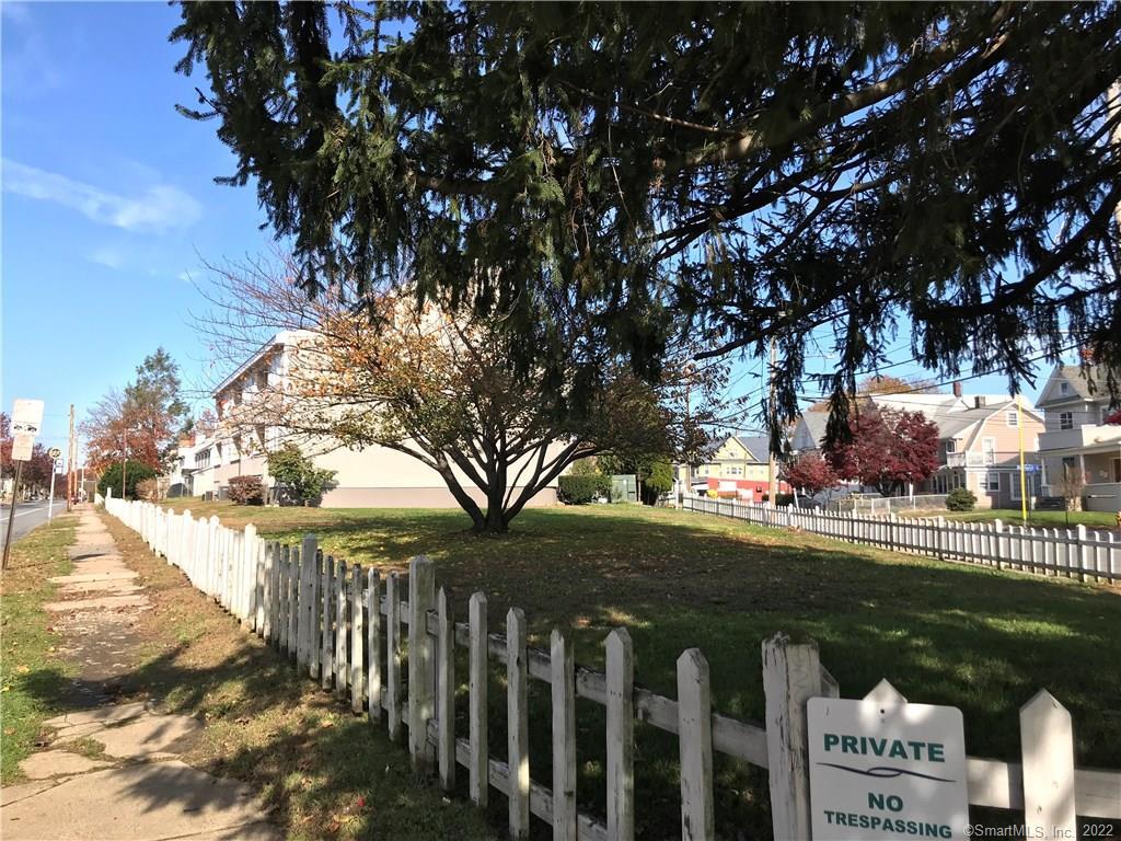 3250 East Main Street, Unit B209 Bridgeport, CT 06606 - Photo 16 of 16 a view of a park with iron fence