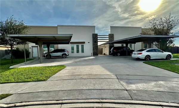 a car parked in the parking area of a building