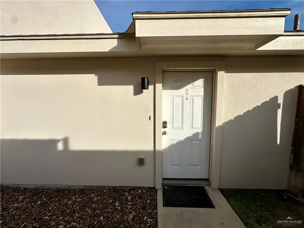 a view of a door and an empty space