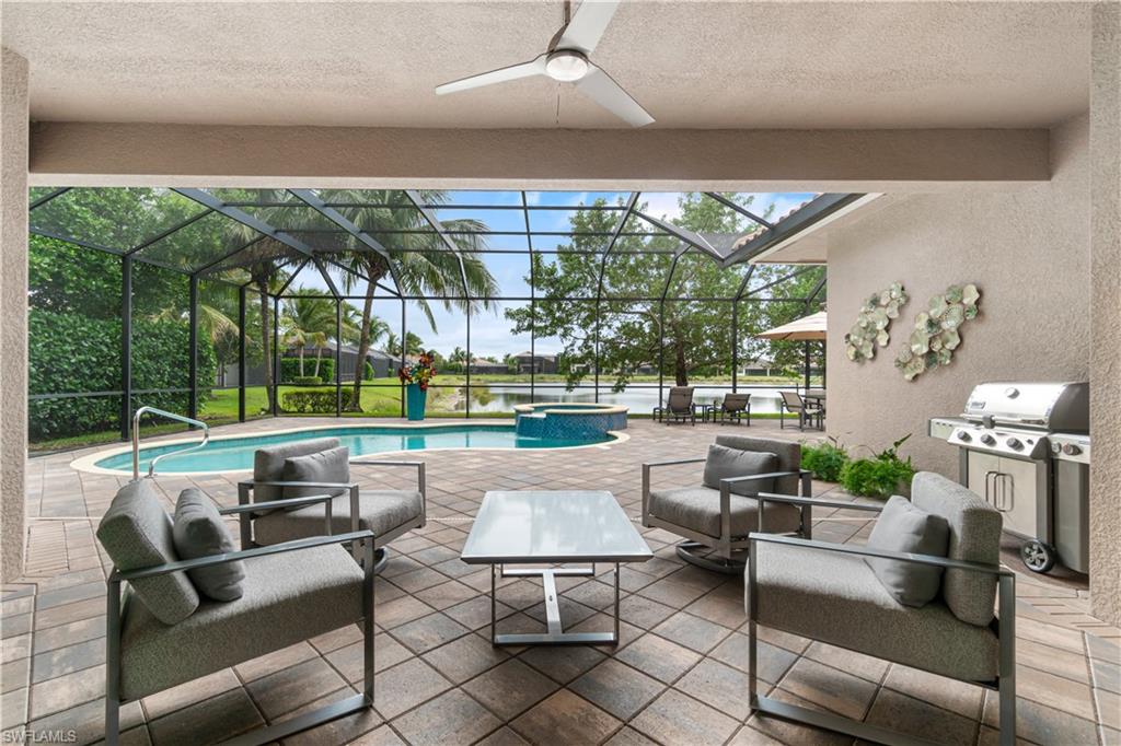 4427 Caldera Circle Naples, FL 34119 - Photo 6 of 50 a roof deck with couches and potted plants