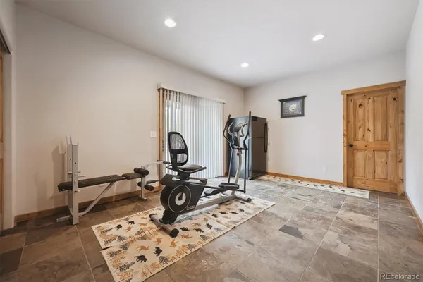 a view of a room with gym equipment