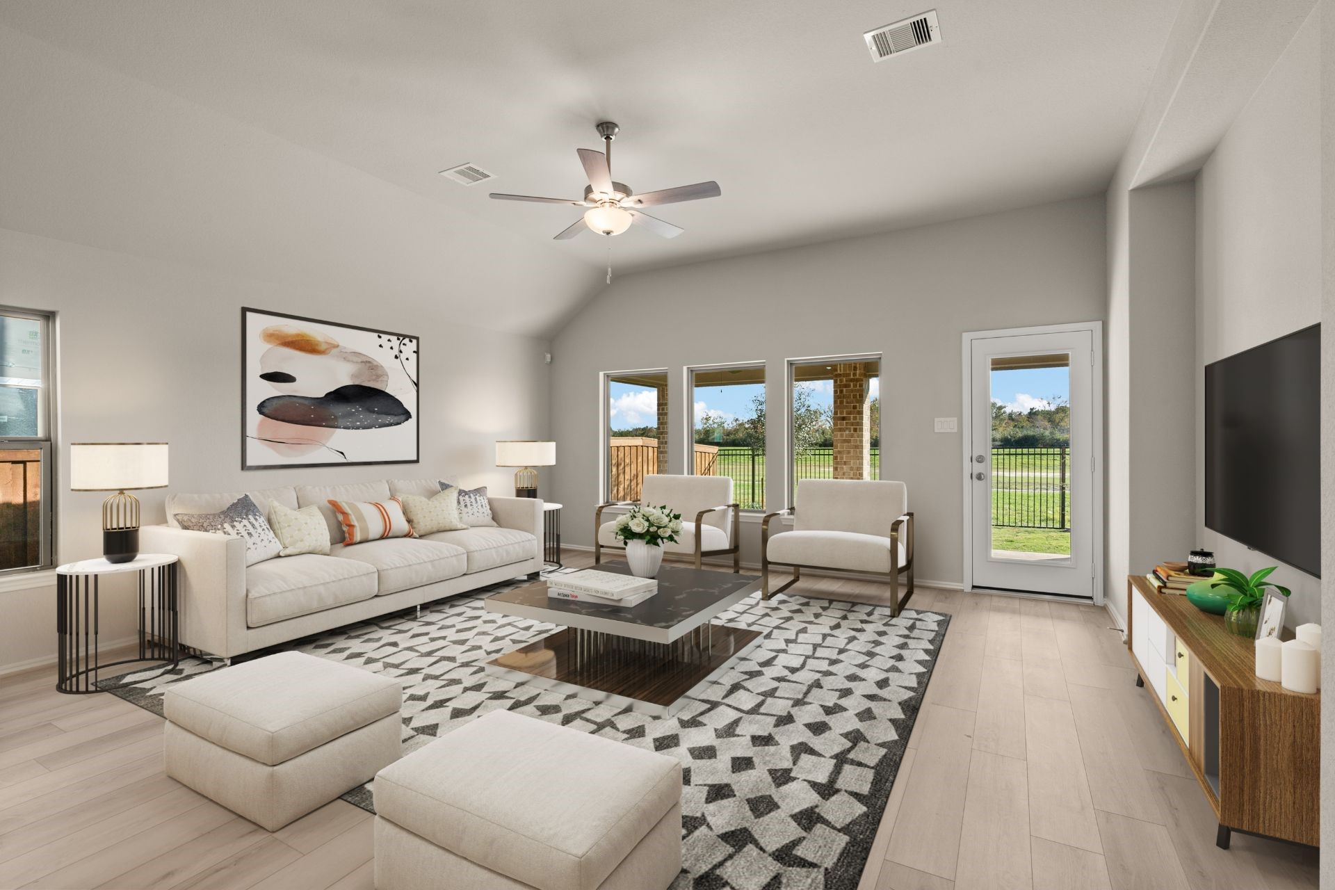 9170 Grand Jubilee Drive Montgomery, TX 77316 - Photo 3 of 18 a living room with furniture and a flat screen tv