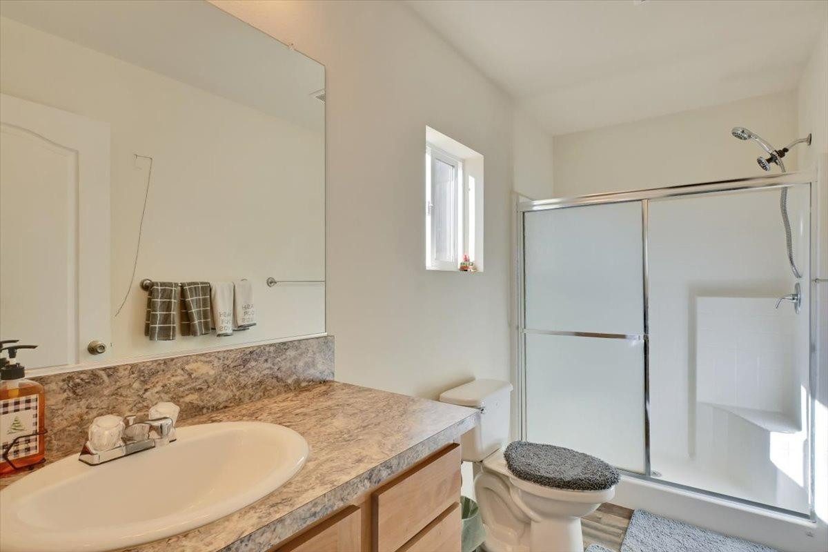 Undisclosed Address Grass Valley, CA 95949 - Photo 15 of 26 a bathroom with a sink and a mirror