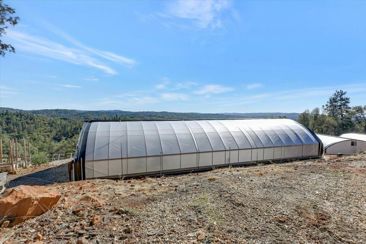 Undisclosed Address Grass Valley, CA 95949 - Photo 20 of 26 a view of a backyard of the house