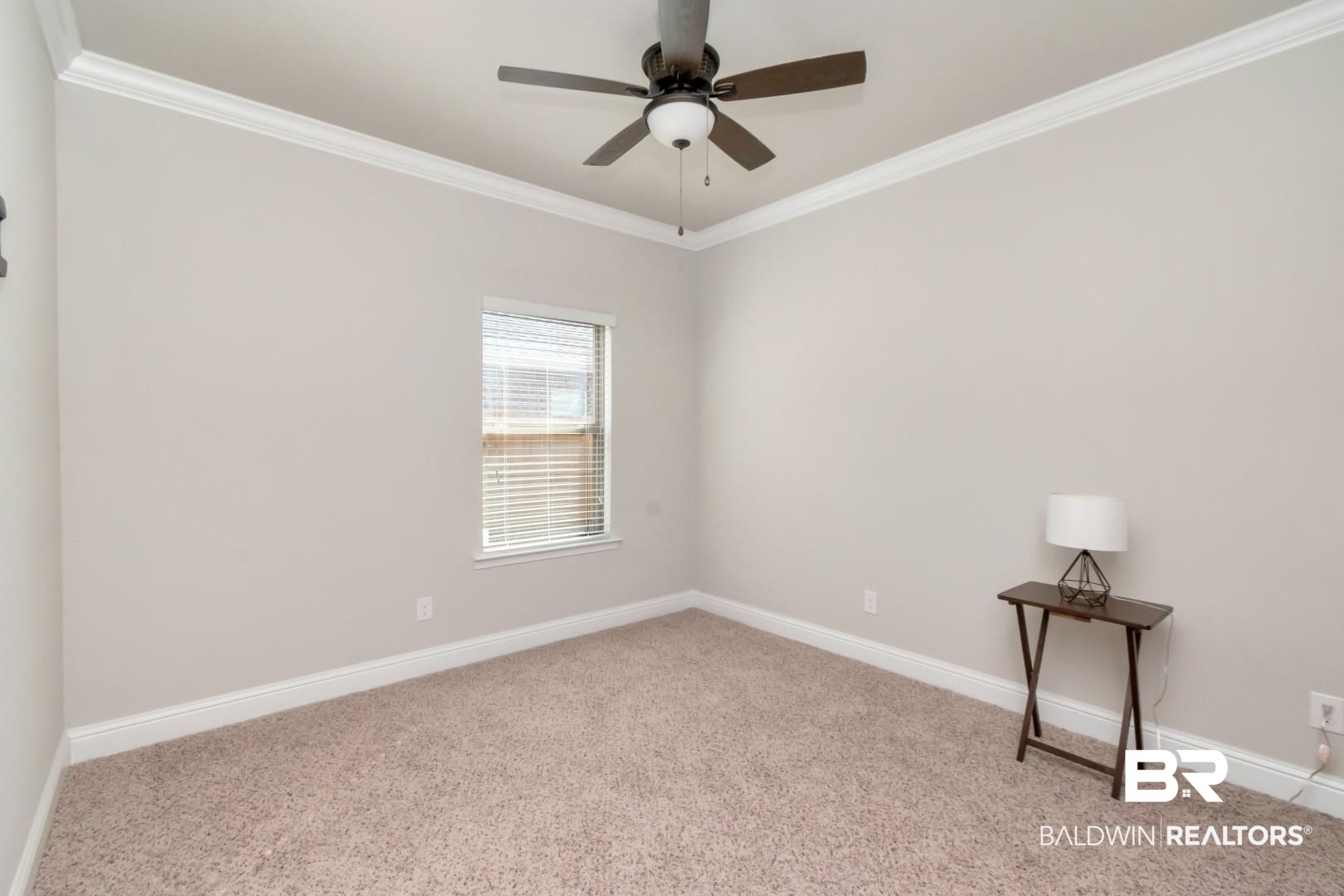 1282 Creek Ridge Court Mobile, AL 36695 - Photo 20 of 33 Empty room with crown molding, carpet, and a ceiling fan