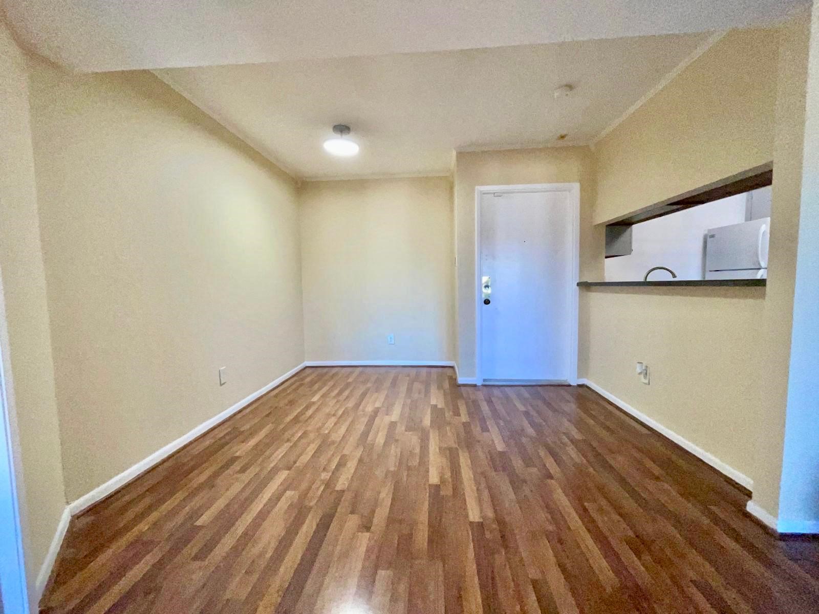 3055 Walnut Bend Lane, Unit 36 Houston, TX 77042 - Photo 6 of 19 View from the balcony door to the main entrance. Kitchen on the right.