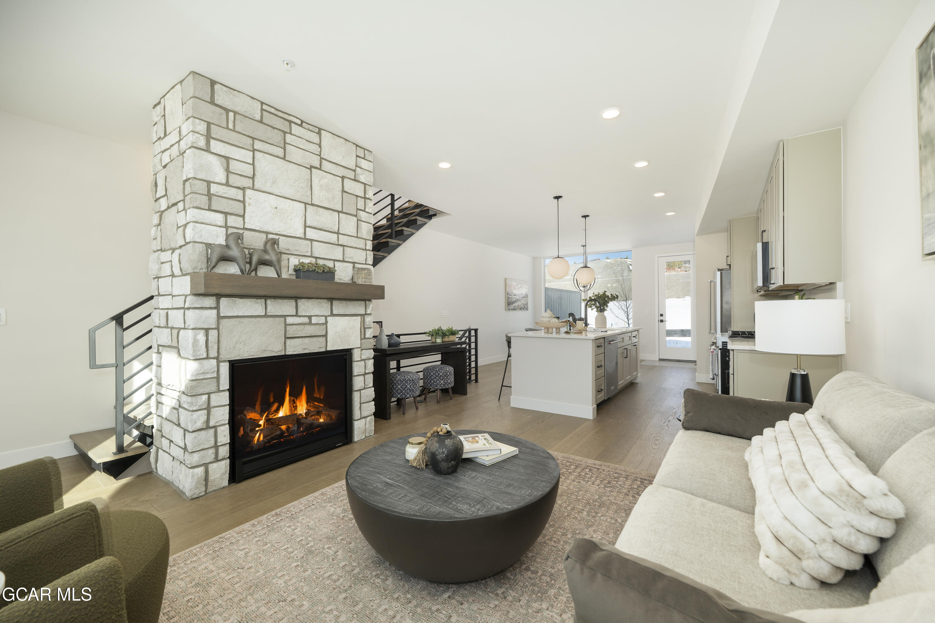 30 Wheeler Road Winter Park, CO 80482 - Photo 16 of 42 a living room with furniture and a fireplace