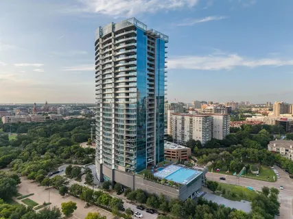 a view of a city with tall buildings