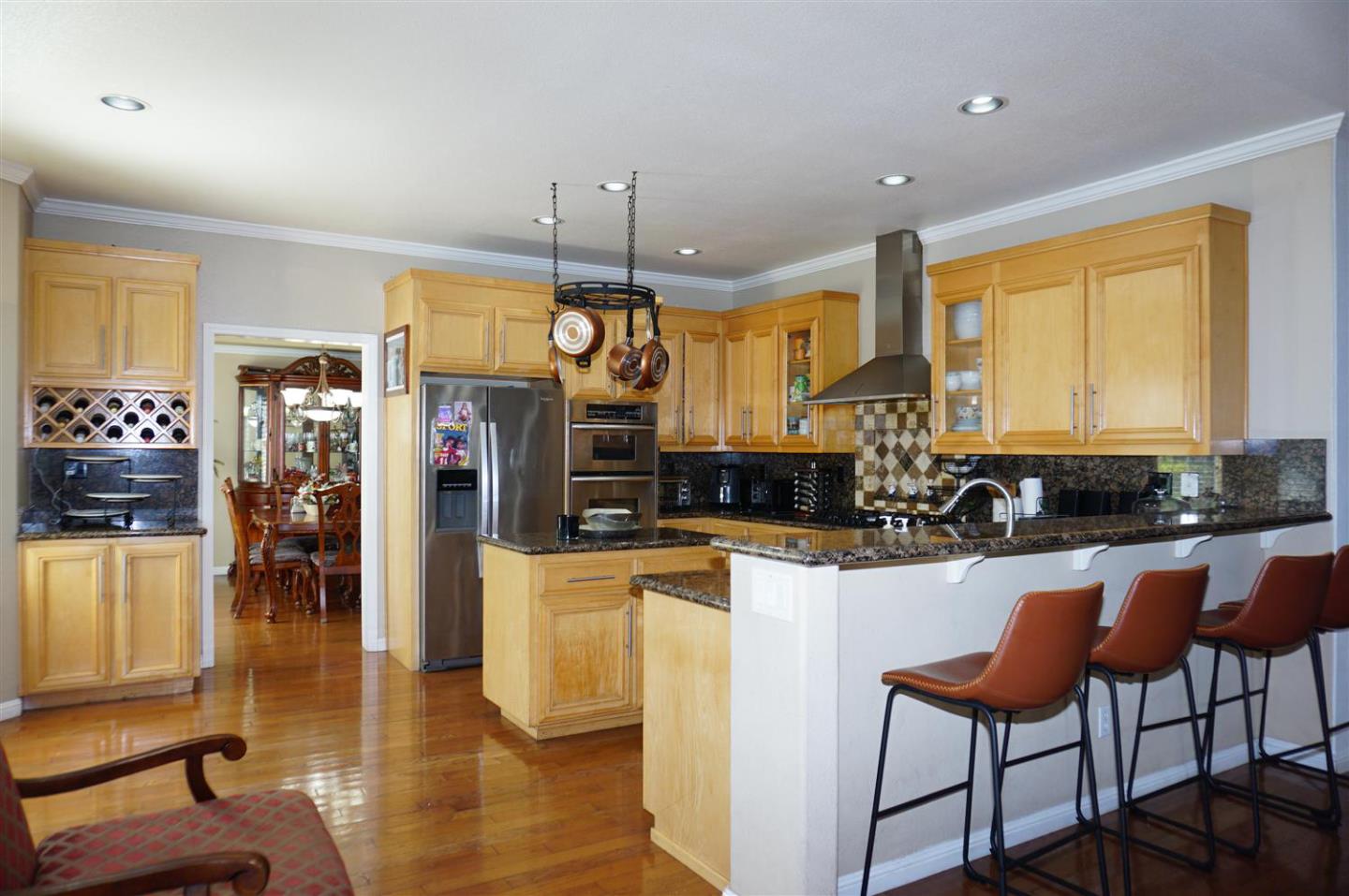 9402 Rodeo Drive Gilroy, CA 95020 - Photo 8 of 22 a view of a kitchen and dining room