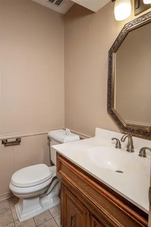 a bathroom with a sink and a toilet