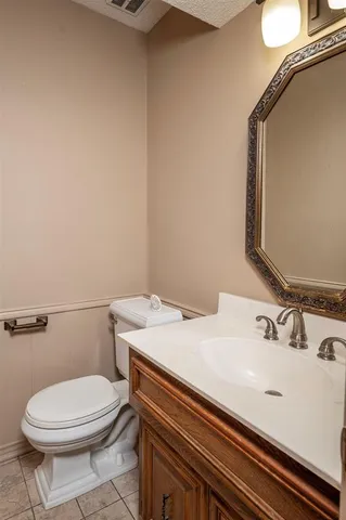 a bathroom with a sink and a toilet