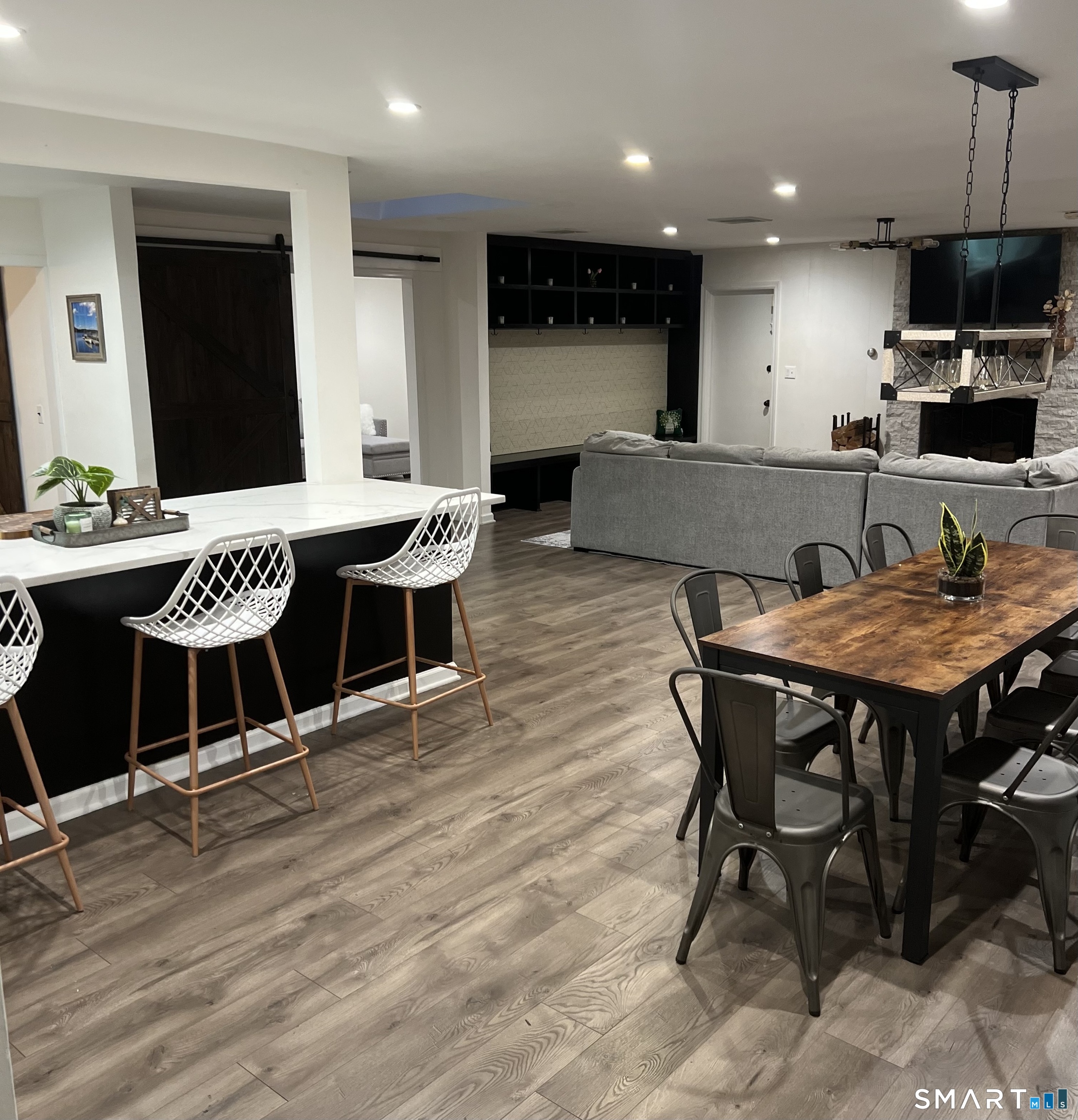 a kitchen with a table and chairs in it