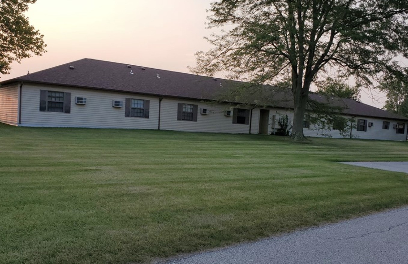a house view with a outdoor space