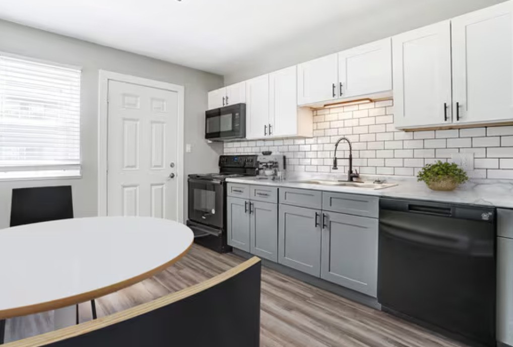 1 Gardner Court Markle, IN 46770 - Photo 3 of 6 a kitchen with cabinets appliances a sink and a window