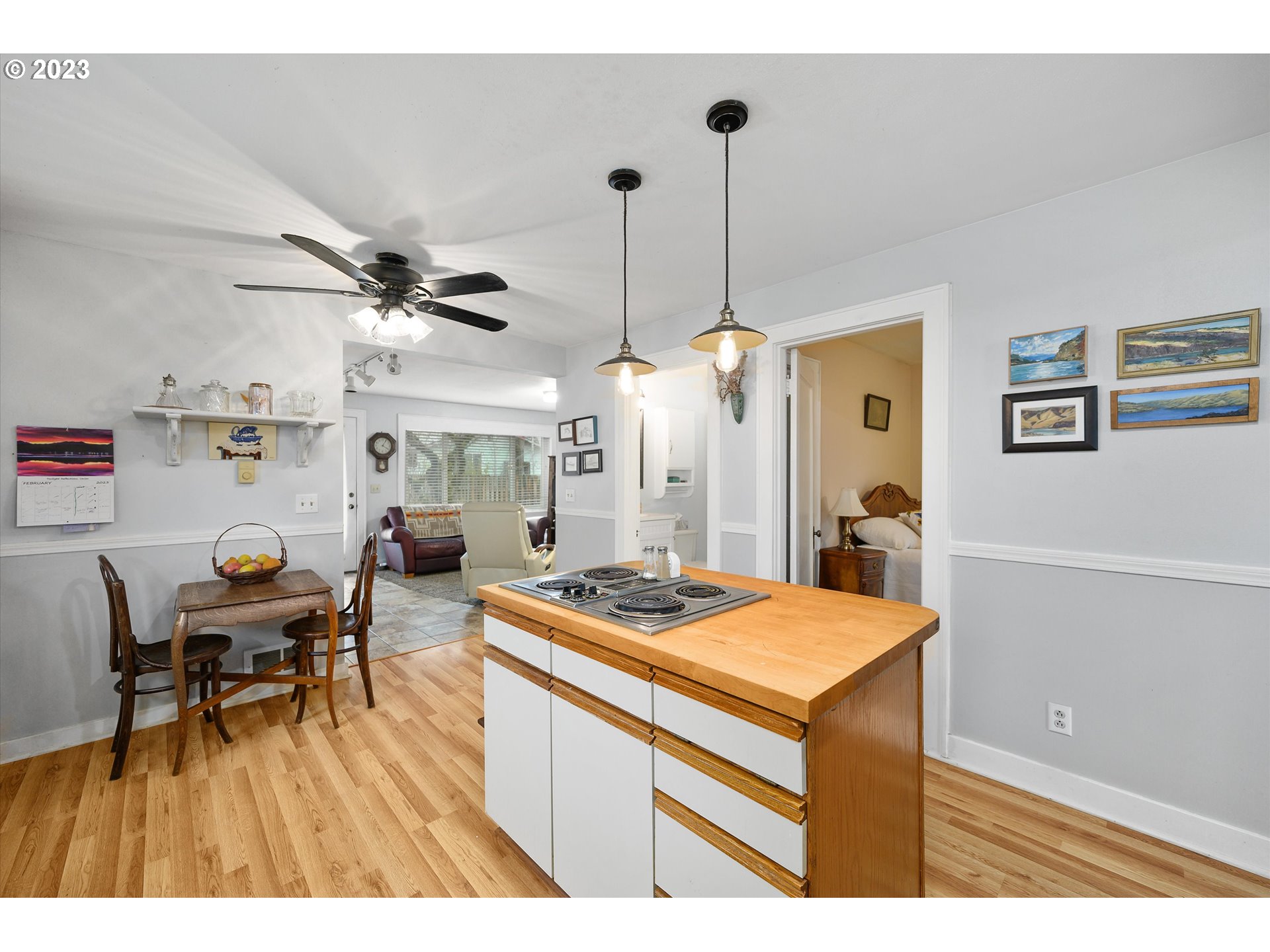 553 Southwest Clay Street Dallas, OR 97338 - Photo 11 of 33 a room with stainless steel appliances kitchen island a table and chairs