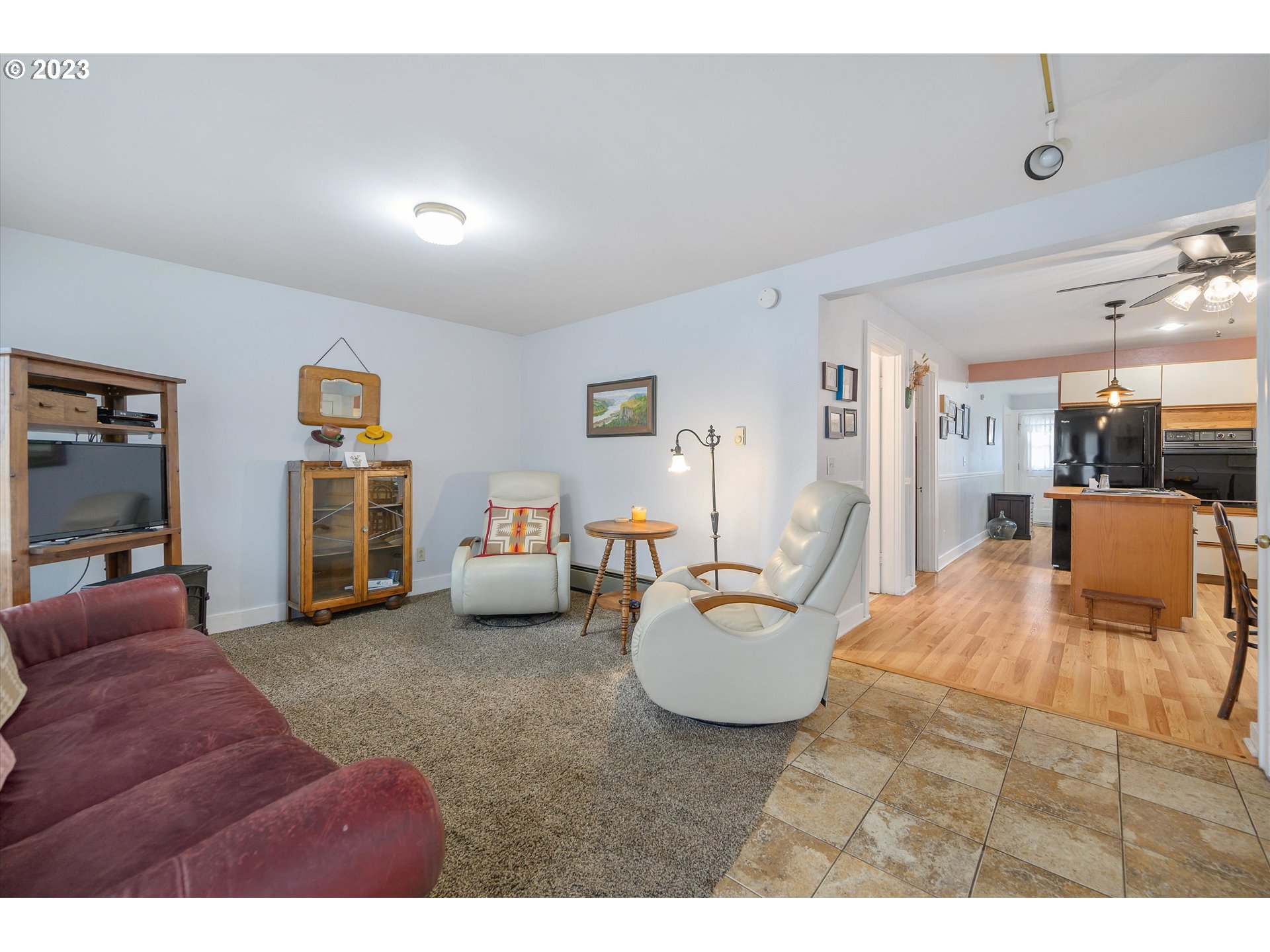 553 Southwest Clay Street Dallas, OR 97338 - Photo 15 of 33 a living room with furniture and a wooden floor