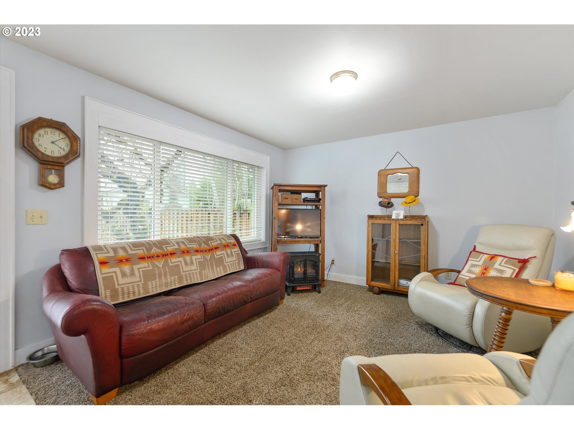 553 Southwest Clay Street Dallas, OR 97338 - Photo 16 of 33 a living room with furniture and a window