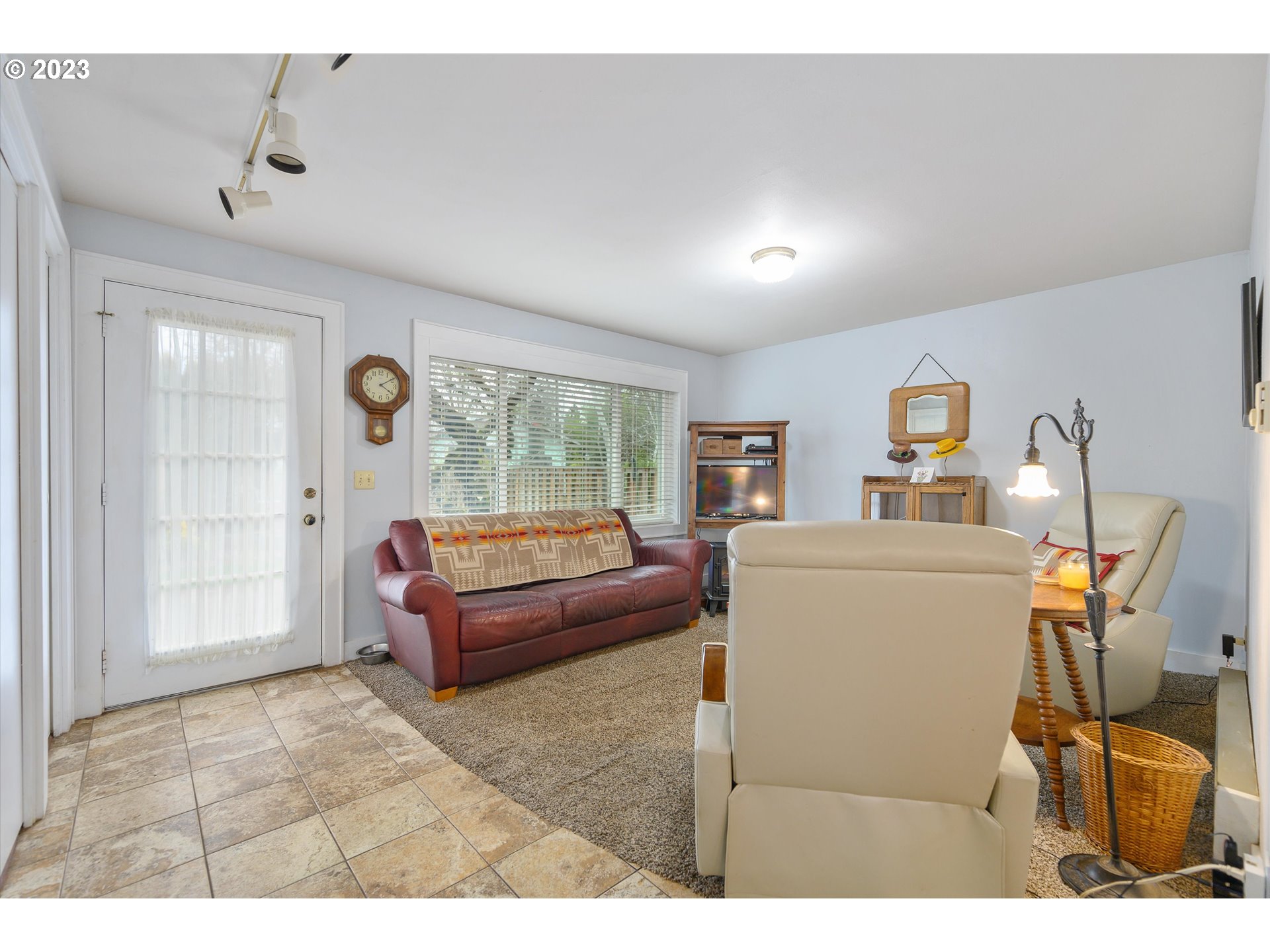553 Southwest Clay Street Dallas, OR 97338 - Photo 17 of 33 a living room with furniture and a window