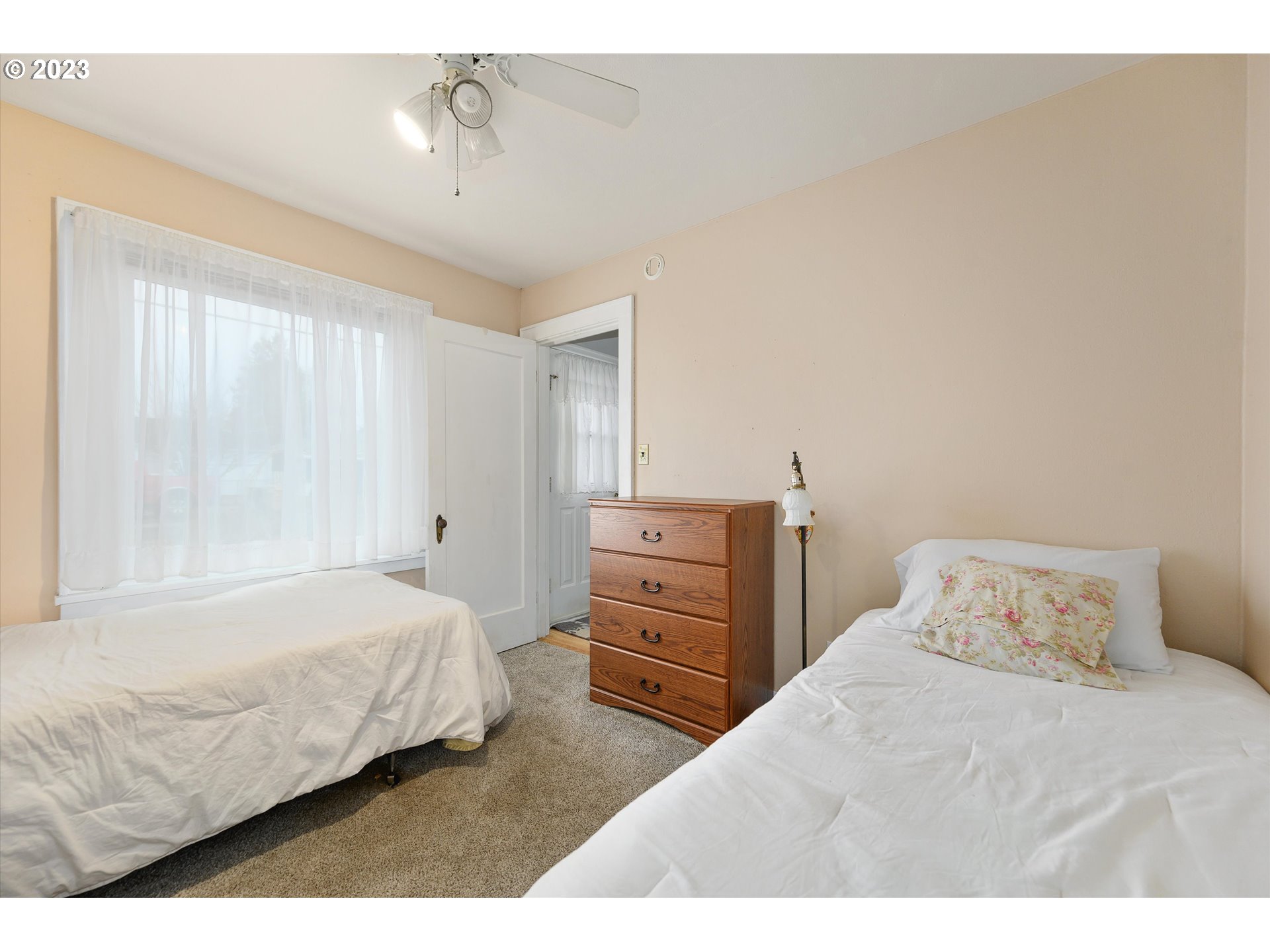 553 Southwest Clay Street Dallas, OR 97338 - Photo 25 of 33 a bedroom with a bed and a cabinets