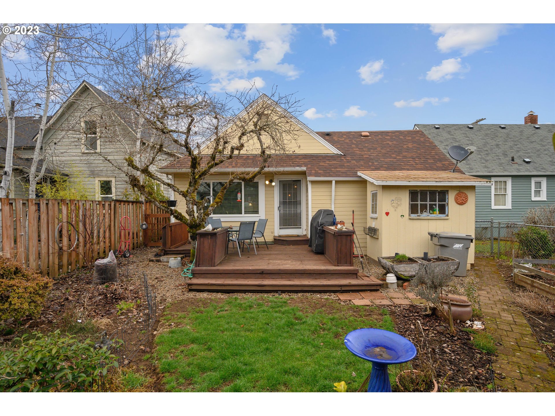 553 Southwest Clay Street Dallas, OR 97338 - Photo 26 of 33 a view of a house with backyard porch and sitting area