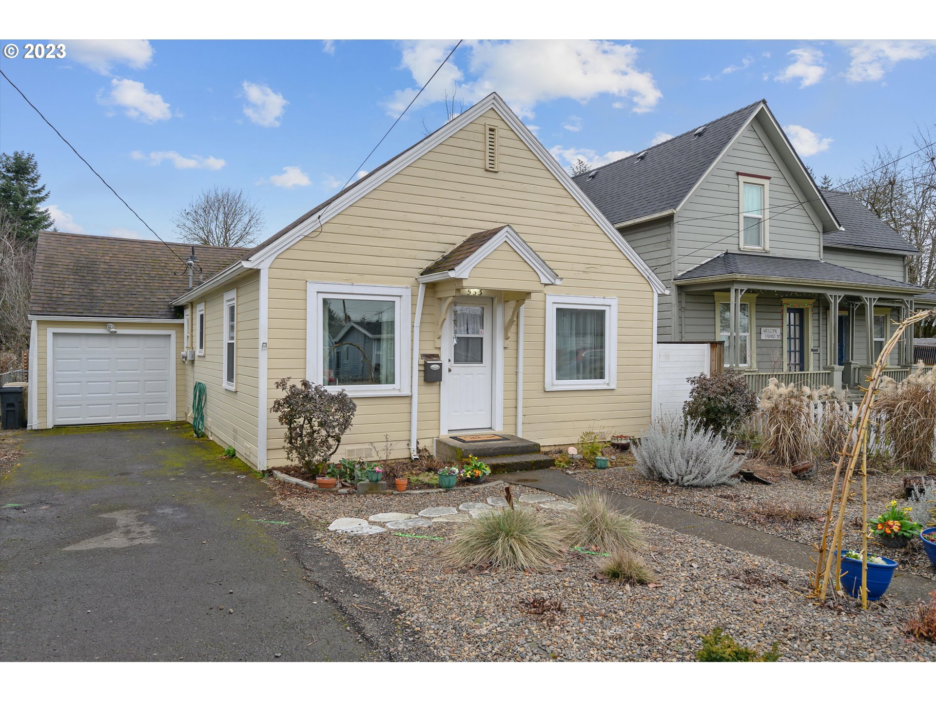 553 Southwest Clay Street Dallas, OR 97338 - Photo 3 of 33 a view of a house with a yard