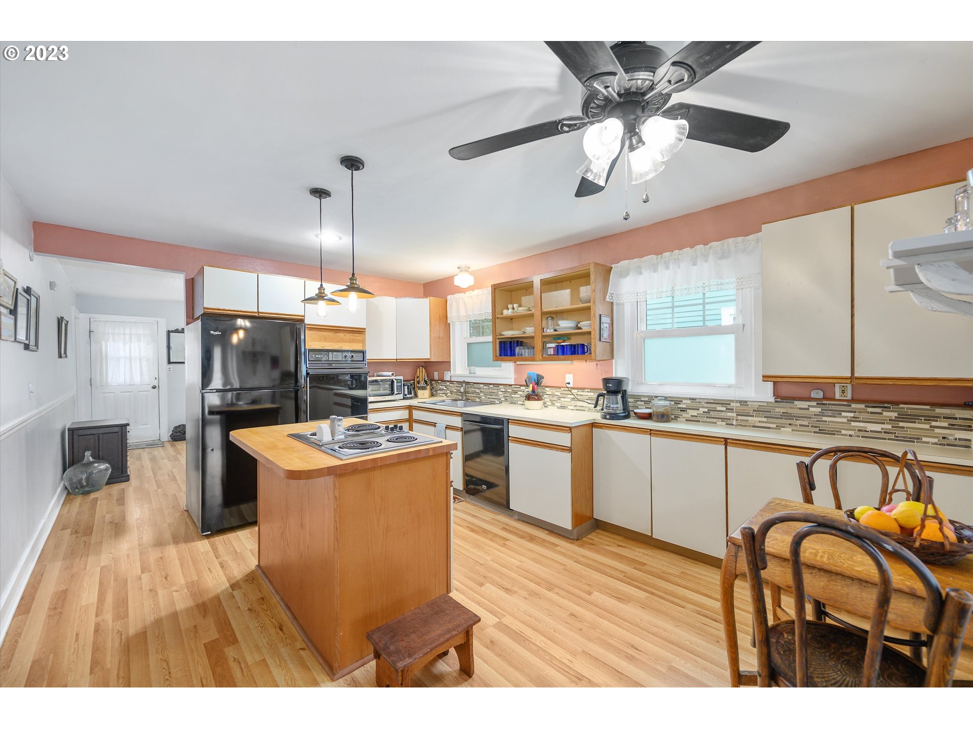 553 Southwest Clay Street Dallas, OR 97338 - Photo 8 of 33 a open kitchen with stainless steel appliances granite countertop a stove and cabinets