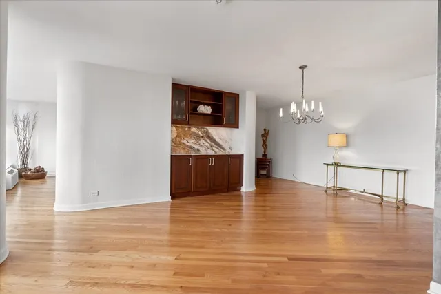 a view of a livingroom with wooden floor