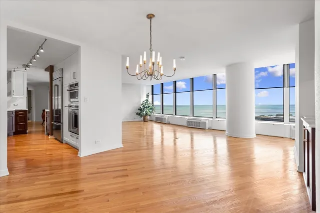 a view of a livingroom with wooden floor